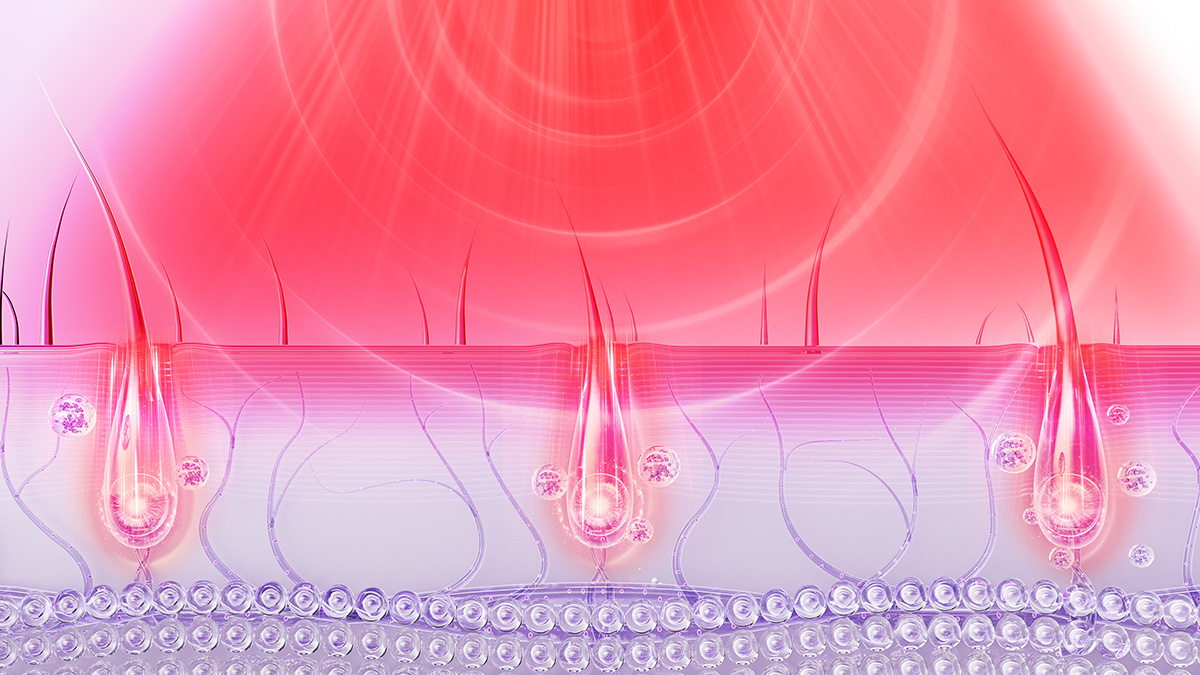 Depiction of LUNA™ 4 hair device's red LED therapy acting on the scalp